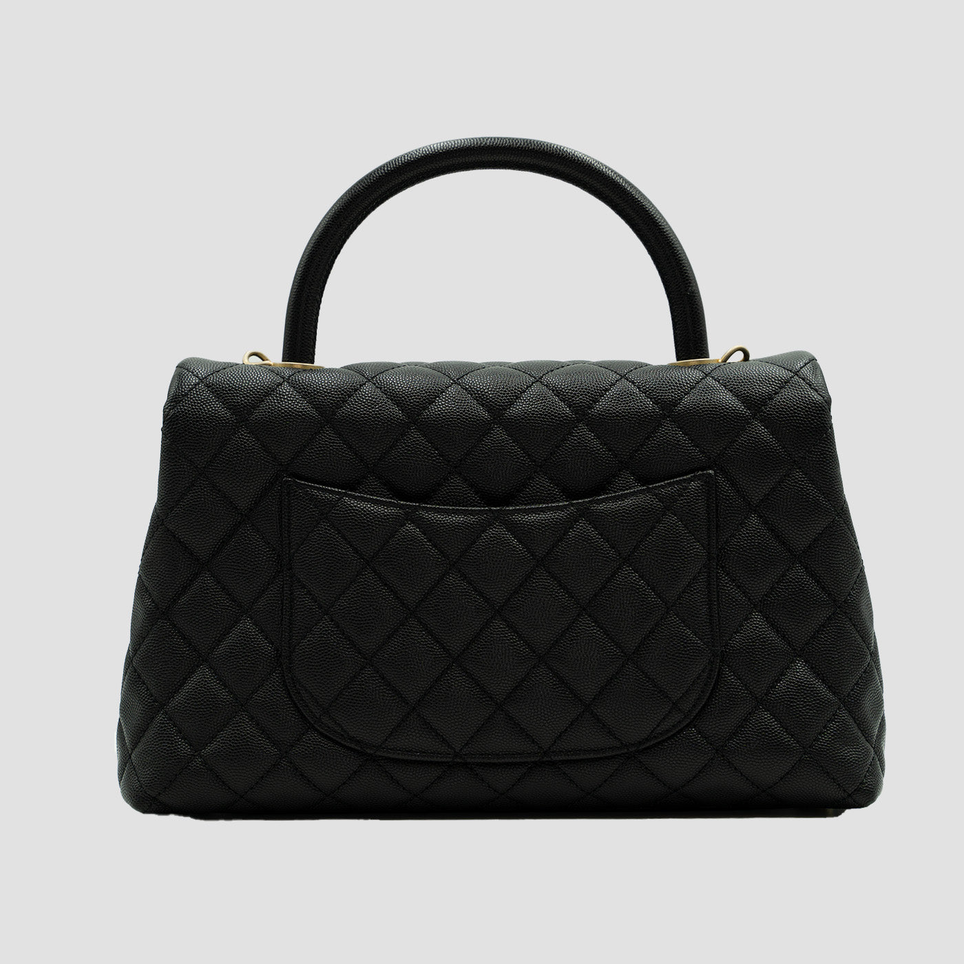 CHANEL Black Quilted Caviar Large Coco Top Handle Pale Gold Hardware